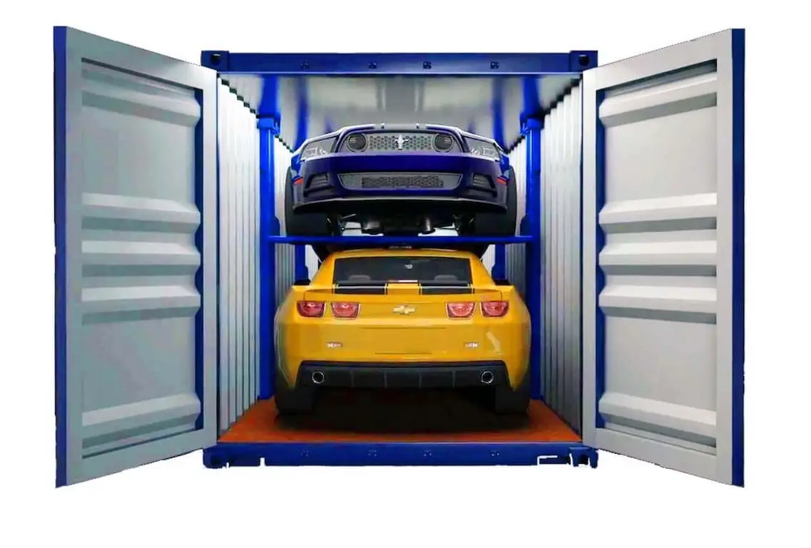 Two high-performance sports cars (yellow and blue) securely stacked on a rack inside an open shipping container for transport.